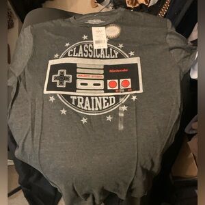 Men’s short sleeve gamer Tshirt in Large and gray in color. NWT